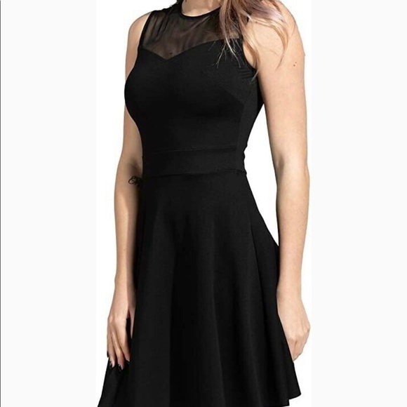 Ya Los Angeles Dresses & Skirts - ☀️Black mid length dress with mesh top and flared waist